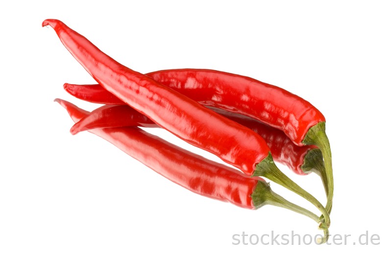 IMG_0247_peppers.jpg - two red peppers on a mirror isolated on a white background