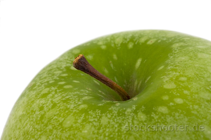 IMG_9538_apple.jpg - detail of a granny smith apple isolated on white background