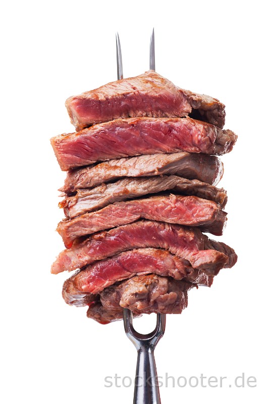 _MG_9213_steakslices.jpg - slices of steak on a meat fork