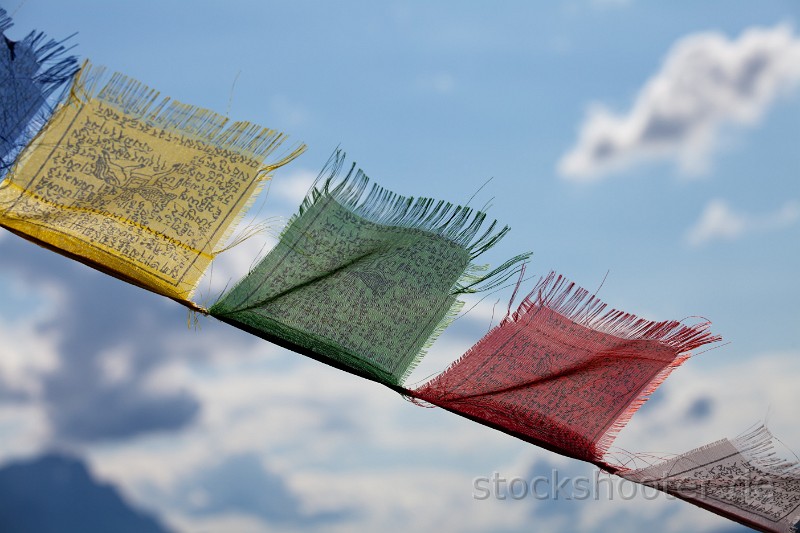 _MG_1688_flags.jpg - tibetan flags and a cloudy sky